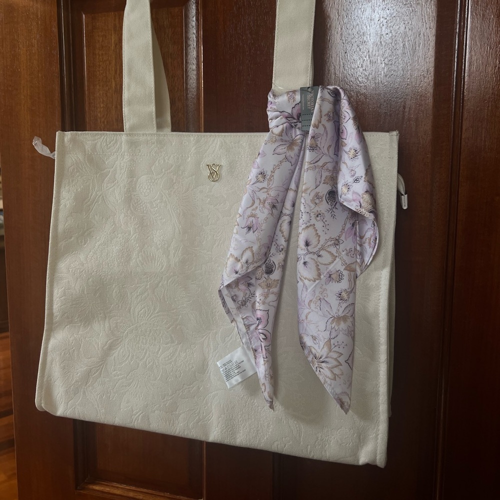 BRAND NEW!! Victoria Secret Cream Tote with Floral Accent & Purple Scarf.